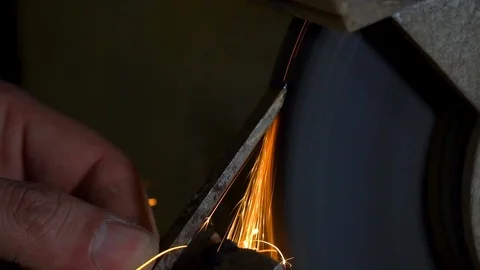 Sharpening tool before working on a tool Stock Footage 107844075