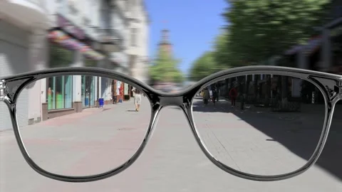 Sharpness with glasses walking around the city Video stock 154352726
