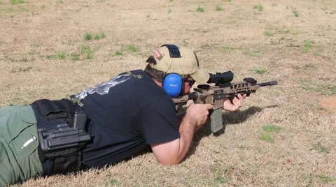 Sharpshooter Lying on Ground Stock Footage 58579800