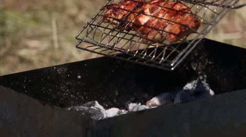 Shashlyk grilling on the bbq, closeup view Stock Footage 51638467