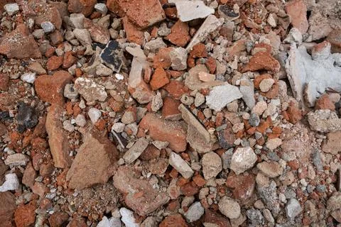 Shattered, broken Red clay Ceramic Bricks, construction waste after buildin.. Stock Photos