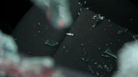 Shattered car window glass on the seat Stock Footage 31663115