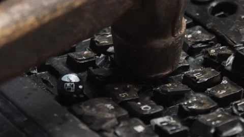 Shattered desktop keyboard. A fired worker smashes a computer keyboard. 動画素材 136850081