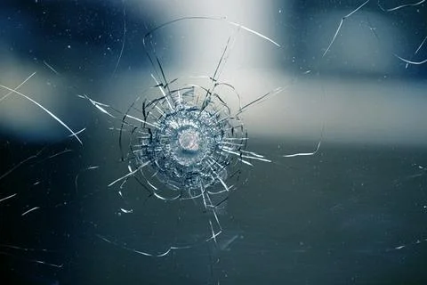 Shattered Elegance: Exploring the Broken Glass Texture Stock Photos