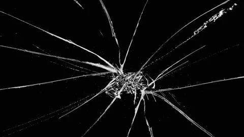 Shattered glass screen crack effect on black background Video stock 337208584