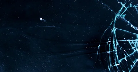 Shattering glass screen with a hammer. Breaking and cracking screen on grunge Stock Footage 118666342