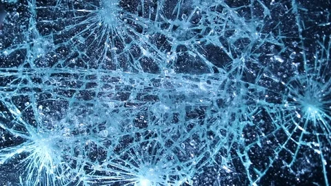 Shattering glass screen with a hammer. Breaking and cracking screen on grunge Stock Footage 118670629