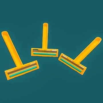 Shaver on colored Stock Photos