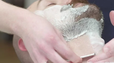 Shaving the beard in the Barber shop Stock Footage 58491696