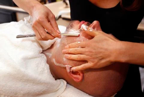 Shaving beards Stock Photos