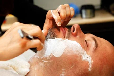 Shaving beards Stock Photos