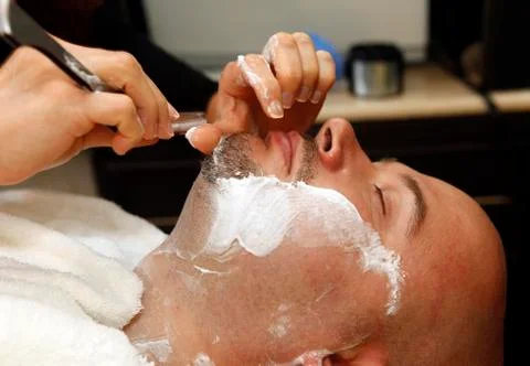 Shaving beards Stock Photos