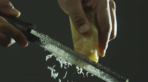 Shaving a block of cheese Stock-Footage 67358980