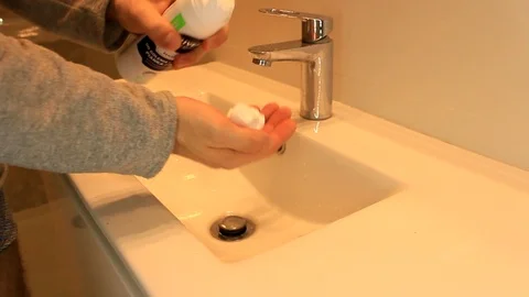 Shaving cream In hand Stock Footage 86414355