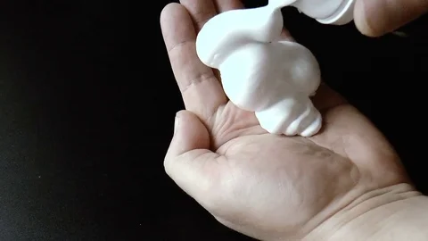 Shaving foam on the palm Stock Footage 79409920