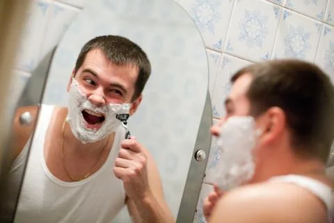Shaving man Stock Photos