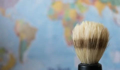 Shaving men around the world Stock Photos