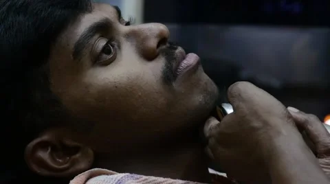 Shaving young indian man Stock Footage 59999601