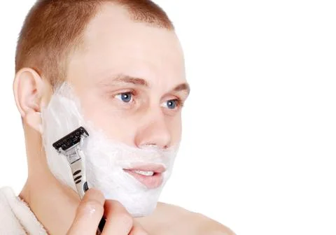 Shaving young man Foto stock