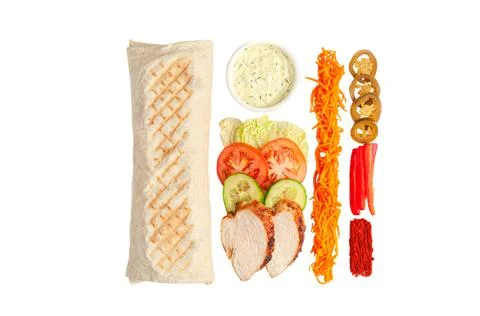 Shawarma and ingredients. The composition includes: lettuce, tomato, cucumber Stock Photos