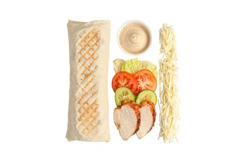 Shawarma and ingredients. The composition includes: lettuce, tomato, cucumber Stock Photos