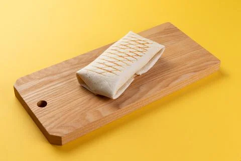 Shawarma on the board. Stock Photos