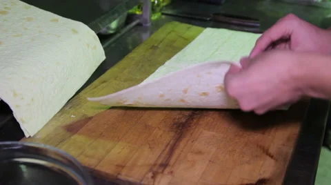Shawarma Dough Cut With a Knife 動画素材 58392624