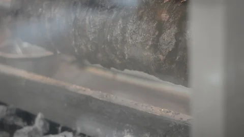 Shawarma machine rotating and grilling meat with spices. Shaurma, Turkish doner- Видео 93562102