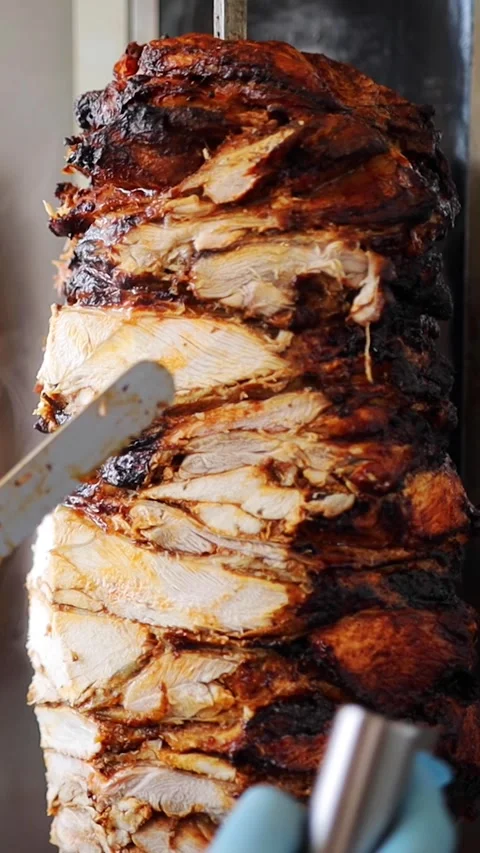 Shawarma meat being cut before making traditional Turkish Doner Kebab. Chef Stock Footage 280386475