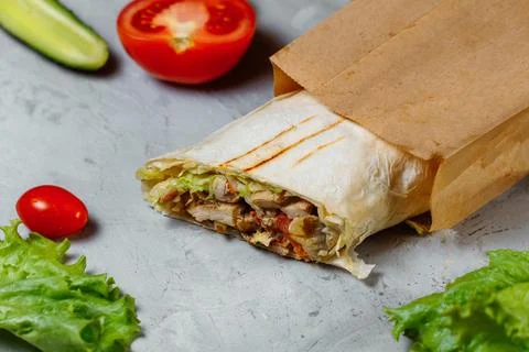 Shawarma sandwich gyro fresh roll of lavash chicken beef shawarma falafel Stock-Fotos
