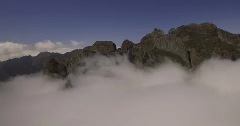 Shawl of clouds on mountain peaks, Madeira 4K Stock Footage 246370876