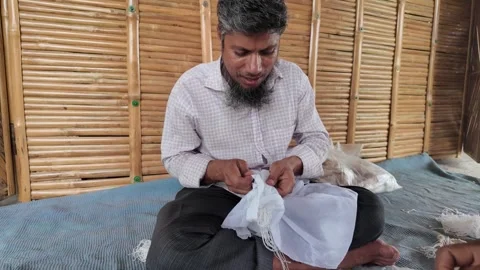 Shawl made with tie-dye resist dyeing technique, Goalpara, Bangladesh Stock Footage 311337799