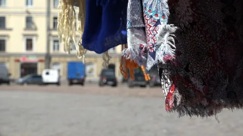 Shawls with different patterns develop in the wind Stock Footage 99521093