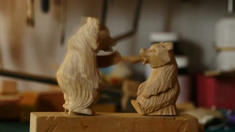 She-bear feeds her cub toy Stock Footage 171907394