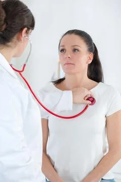 She is checking the heart Stock Photos