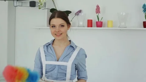 She cleans the dust in the hotel Stock Footage 82156069