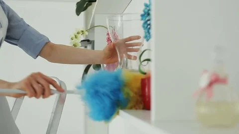 She cleans the dust in the hotel Stock Footage 82156774