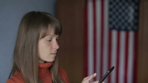 She communicates online on the tablet Stock Footage