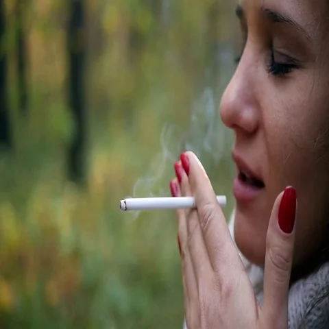 She coughs up cigarettes Video stock 69539793