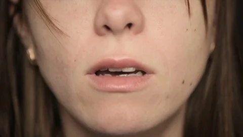 She coughs, close-up.Full hd video Stock Footage 71587844