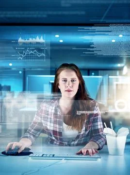 She is a human computer. Portrait of a focused young female programmer workin 스톡 사진