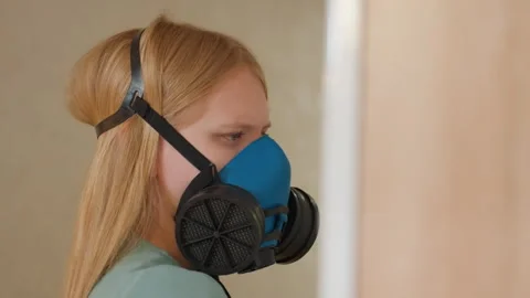 She inspects house surfaces for mold and dampness thoroughly. An expert Stock Footage 341975064