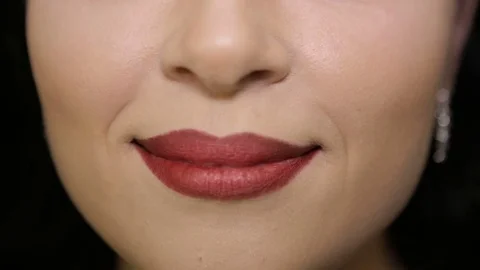 She laughs at the camera. Face close-up. Stock Footage 71447395