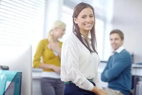 She leads by example. Portrait of an attractive young brunette businesswoman Stock Photos