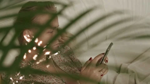 She needs some rest and relaxing with social media Stock Footage 144883760