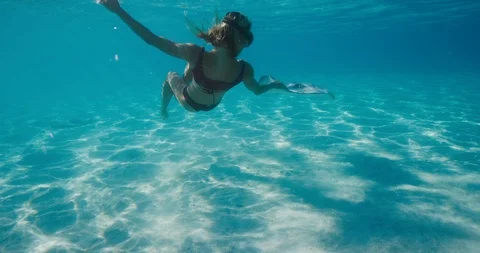 She is at one with the stingrays Stock Footage 115823228