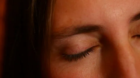 She opens and closes his eyes Stock Footage 2594518