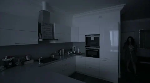 She opens the refrigerator in the kitchen Stock Footage 63364206