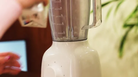 She is Preparing a Milk, a Protein Shake. Stock-Footage 58291544