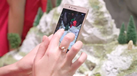She Sets up the Camera Menu on the Phone and Ready to Shoot Stock Footage 68386620